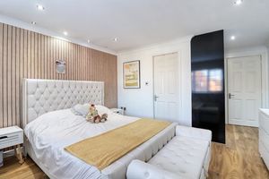 Bedroom One- click for photo gallery